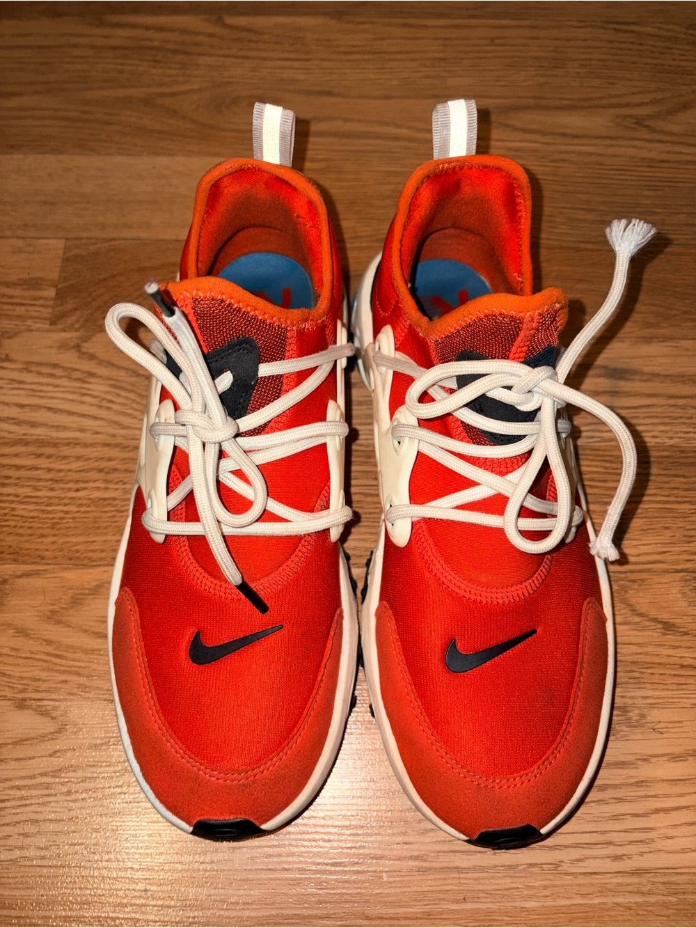 Nike Kids Orange and White Athletic Sneakers with Black Swoosh